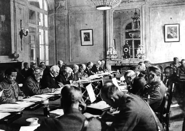 The 1919 Paris peace conference at Versailles after the Great War met "in the shadow of unspeakable human loss"