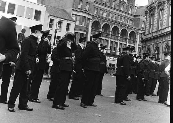 Members of the B Specials - some of them with batons at the ready -
take up position in Waterloo Place during the Battle of the Bogside