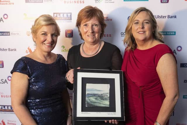 Women in Business chair Nichola Robinson with Wilma Erskine, winner of the Special Recognition Award and Women in Business chief executive Roseann Kelly.