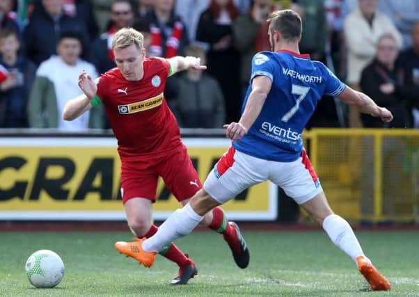 Cliftonville's Chris Curran (left). Pic by INPHO.