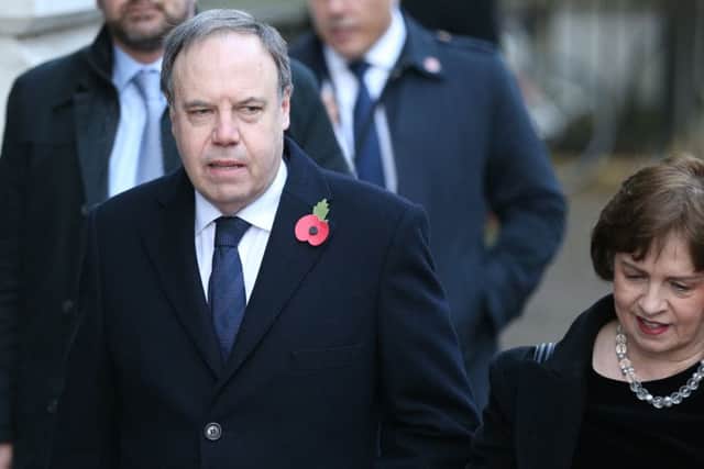Deputy Leader of the DUP Nigel Dodds and wife Diane in Downing Street arriving for the Remembrance Sunday service at the Cenotaph memorial in Whitehall, central London