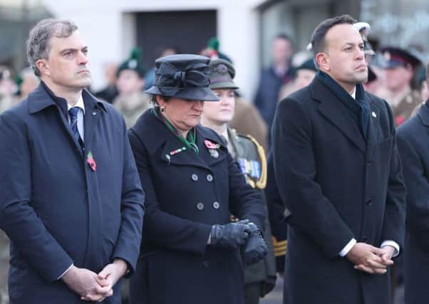 Northern Ireland Secretary Julien Smith, DUP leader Arlene Foster and Taoiseach Leo Varadkar at a Remembrance Sunday service at the Cenotaph in Enniskillen