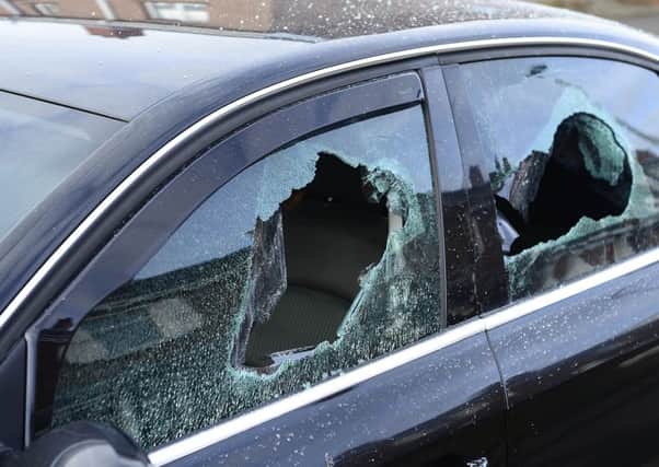 Police are investigating an attack on a property in north Belfast. The front window of a house in Etna Drive was smashed, and the windows of a car parked in the driveway were damaged