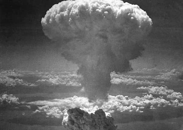 A mushroom cloud, after the second nuclear bomb ever used in warfare explodes over the Japanese city Nagasaki, on August 9, 1945 "The harrowing destruction of World War I (and II) pales into insignificance when compared to what an outright nuclear war will bring in its train. In the 70 years since World War II the destructive military power has the capacity to bring about an Armageddon" (AP Photo/USAF)