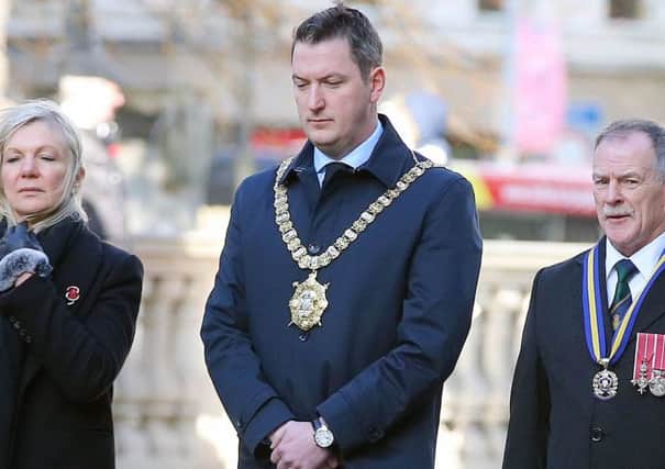 John Finucane, seen above on Remembrance Day 2019, is more plausible than Sinn Féin's old guard, but if elected will use his position to attack the state on legacy and assail British sovereignty. 

Picture by Jonathan Porter/PressEye