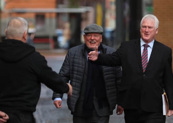 UUP candidate Michael Henderson (right) arriving at the Electoral Office today