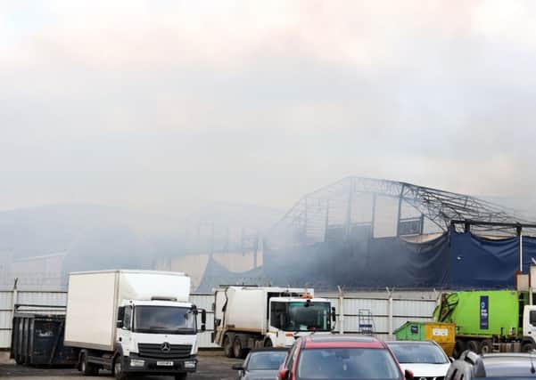 The scene this morning after firefighters spent the night battling a large fire at a warehouse on Duncrue Street which broke out shortly after 11pm last night. 
Photo Laura Davison/Pacemaker Press