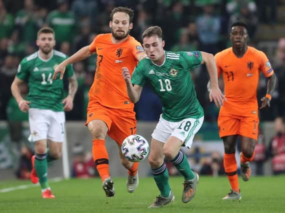 Action from Northern Ireland v Holland at the National Stadium at Windsor Park.