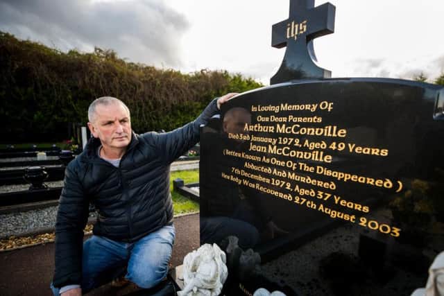 Michael McConville, son of IRA murder victim Jean McConville, at his parents grave in Lisburn, He has urged the Government to establish a public inquiry to seek answer