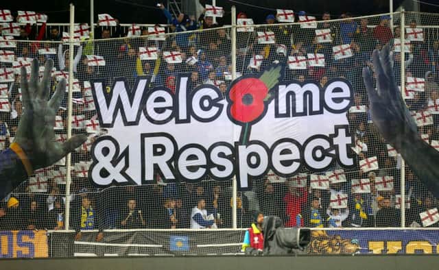 A Welcome and Respect sign during the UEFA Euro 2020 qualifying match at the Fadil Vokrri Stadium, Pristina. PA Photo.
