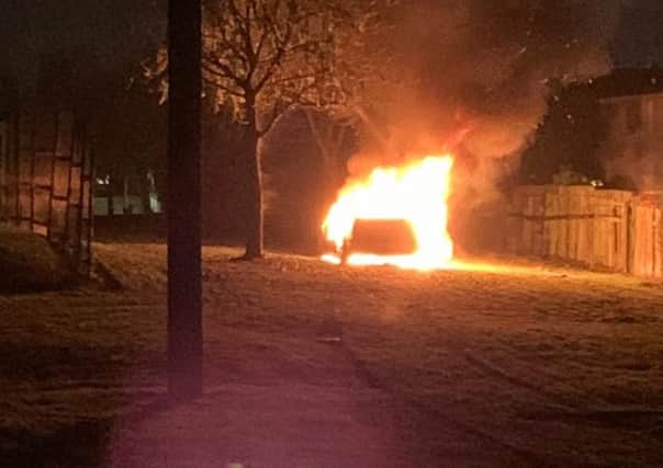 Car on fire in Lurgan