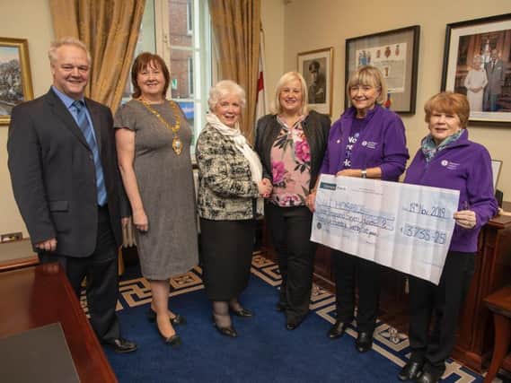 Mrs Joan Christie CVO, OBE pictured with Mayor Maureen Morrow and Heather Weir Chief Executive NI Children's Hospice, David Clements, Chair NI Hospice, Muriel Barr and Toni Bailes, Ballymena NI Hospice support group.