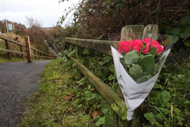 Flowers left at the scene in Larne