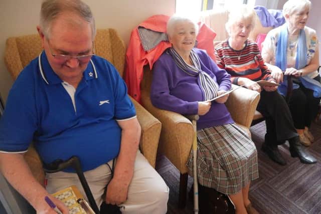 Some of the participants at Age NI enjoying a game of bingo