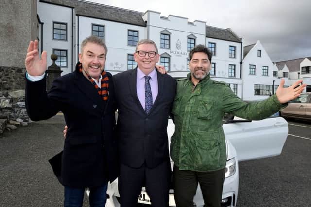 Brian Kennedy launches his Christmas concerts at The Ballygally Castle  with Norman McBride, hotel manager and Philip McGarrity from Philip McGarrity Motors, the concert sponsors.