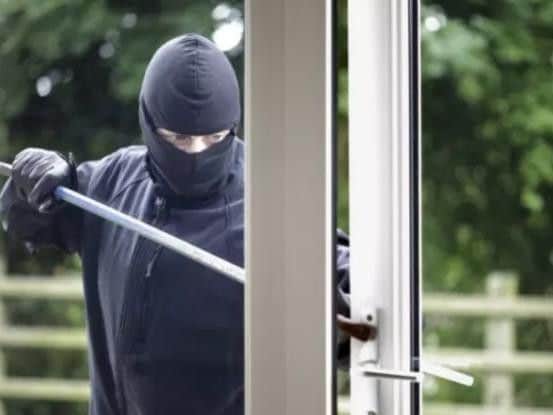 Burglar forces window of property