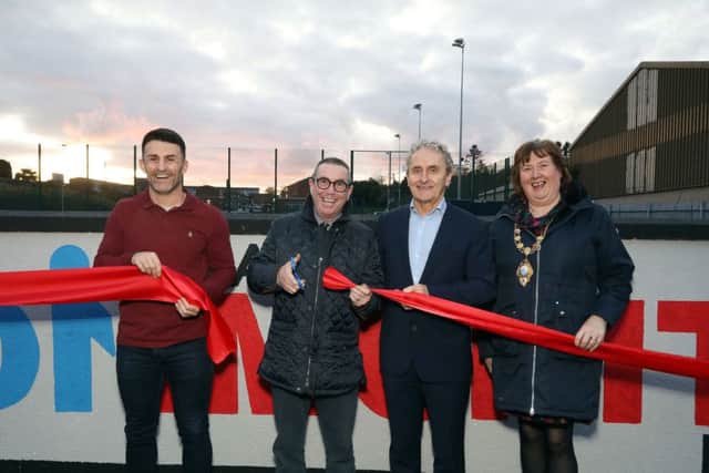 Gareth McConnell, Factory Community Forum, Dave Boy McAuley, Paddy Harte, IFI chairman and Mid and East Antrim Mayor, Cllr Maureen Morrow, officially unveil the new artwork.