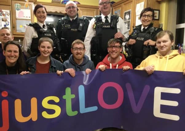 Mid Ulster Pride Committee with members of a local Neighbourhood Policing Team from Coalisland.
Back row: Alexis Cox, Front row: Louise Taylor, Elise Hughes, Jonathan Campbell, Cathal Ocianian, Stephen Kennedy.