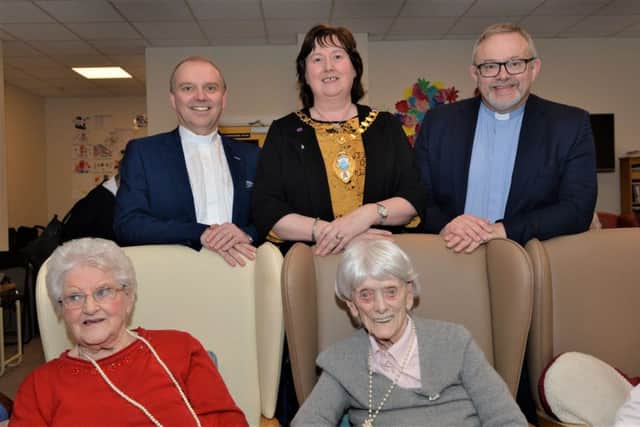 May McCracken (seated right) with Betty Watson, the Rt Rev Dr William Henry, Moderator of the General Assembly, the Mayor, Cllr Maureen Morrow, and Angus Stewart, Minister of Whiteabbey Presbyterian Church. INCT 04-004-PSB