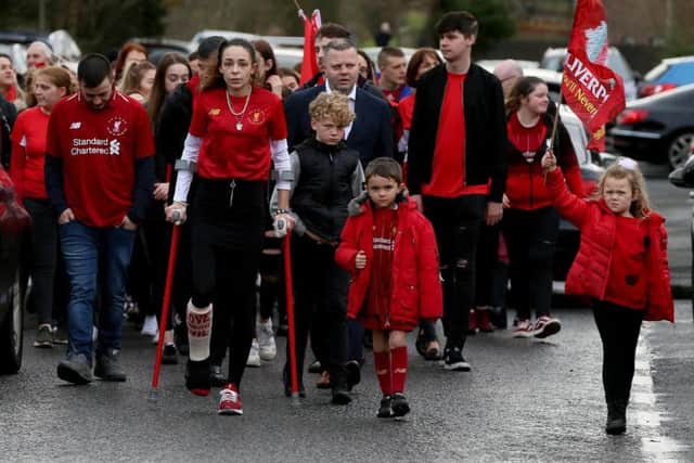 Funeral of Nathan Gibson, leaving Westacres, Craigavon, today. Nathan's body was discovered on a towpath near Lake Road in Craigavon by police on Thursday, January 16. Mourners were asked to wear red in tribute to Nathan's love for the Liverpool. Photo Laura Davison/Pacemaker Press