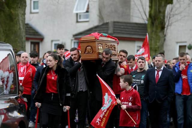 Funeral of Nathan Gibson, leaving Westacres, Craigavon, today. Nathan's body was discovered on a towpath near Lake Road in Craigavon by police on Thursday, January 16. Mourners were asked to wear red in tribute to Nathan's love for the Liverpool. Photo Laura Davison/Pacemaker Press