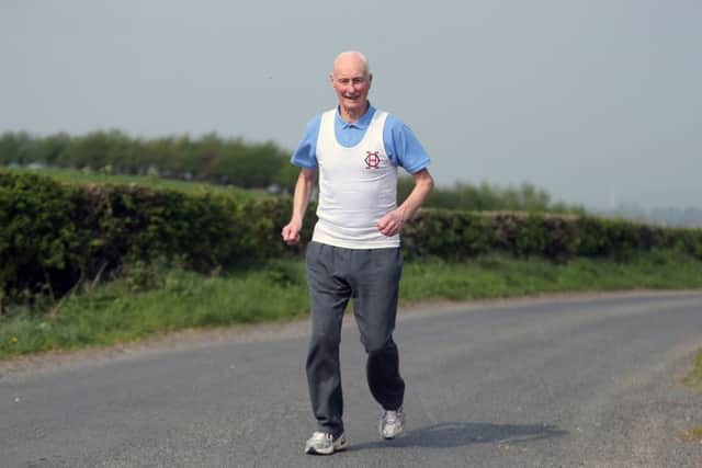 File photo dated 18/04/19 of London Marathon Ever Present runner Ken Jones at his home in Strabane Co. Londonderry. PA Photo. Issue date: Tuesday February 4, 2020. See PA story SPORT Marathon. Photo credit should read: Niall Carson/PA Wire