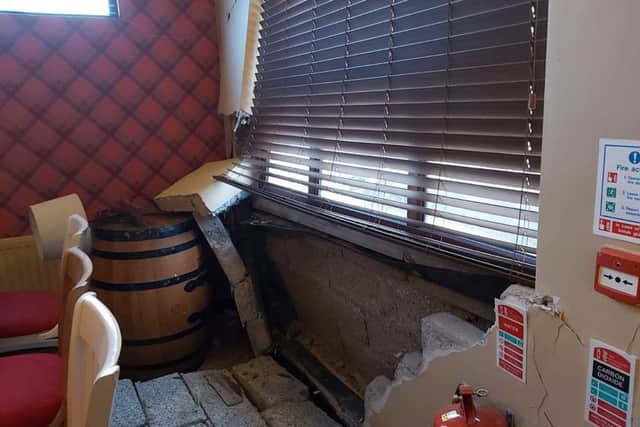 Damage to Sally McNally's after car smashed into a wall