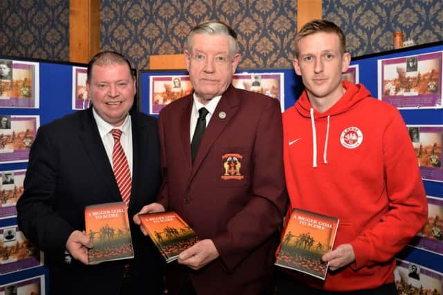 Attending the booklet launch in the Glasgow Rangers Supporters Club are (from left) Gareth Clements, chairman of Larne FC, Martin Bird, from the Larne & District Great War Society and Jeff Hughes, captain of Larne FC. INLT 08-004-PSB