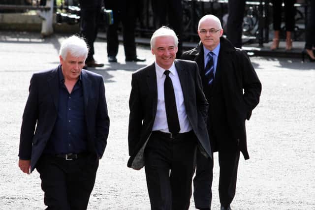Television presenters  Paul Clarke and Frank Mitchell, arriving for the funeral Mass of Gerry Anderson in St. Eugenes Cathedral. Der 3414-0390MT.