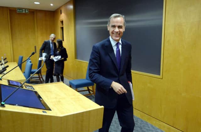 Bank of England governor Mark Carney in a jovial mood as he reflects on a stronger banking industry