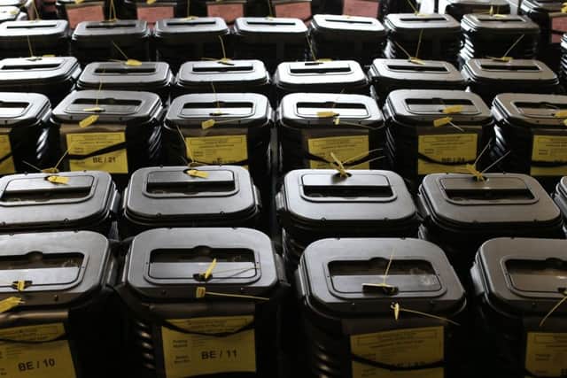 Ballot boxes are tallied and stored ready for delivery to polling stations in 2015. Photo: Niall Carson/PA Wire