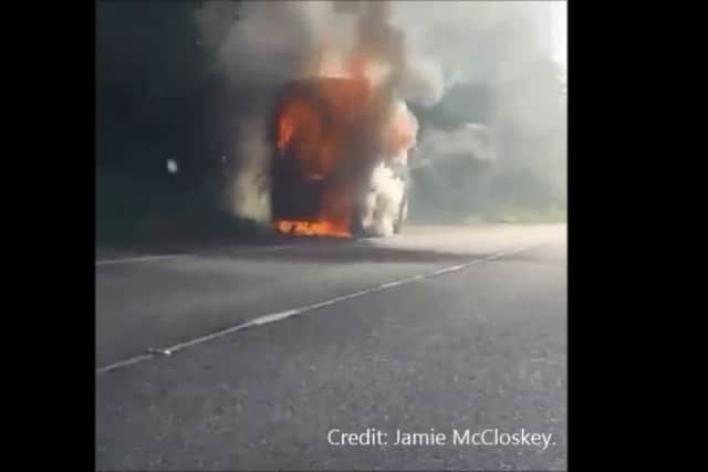 The Ulsterbus in flames on the M22