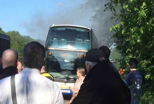 The view after passengers got off bus which went on fire on M22 on Monday evening