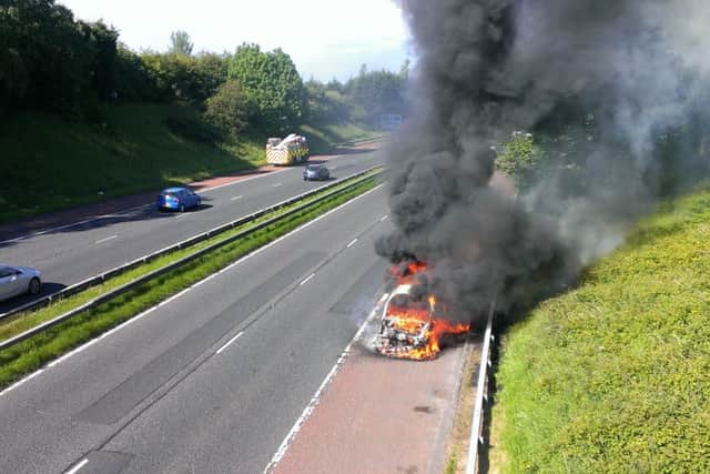 The care on fire on the M1.