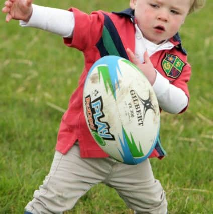 STARTING YOUNG. Twenty two month old Theo McHenry was having fun at ARFC on Sat..INBM32-15 044SC.