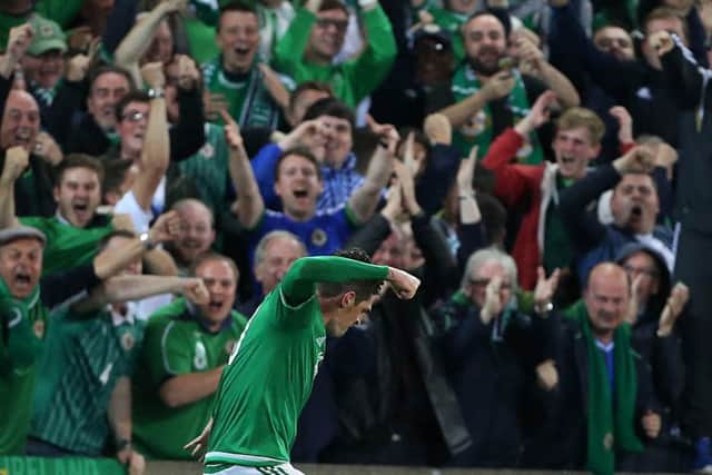 Kyle Lafferty laps up the applause after his equaliser against Hungary