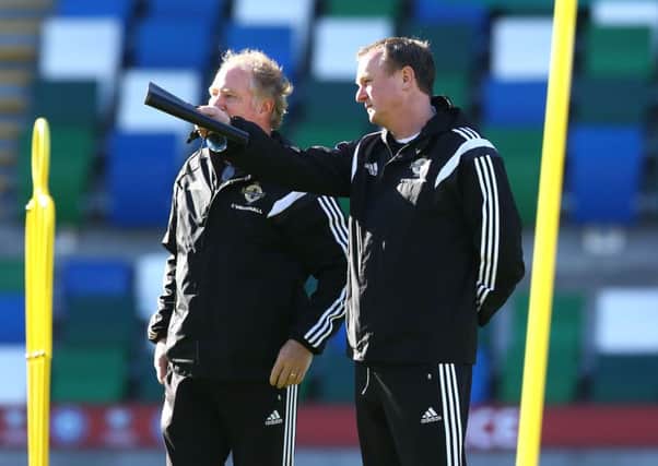 Michael O'Neill (right) with assistant and World Cup legend Jimmy Nicholl
