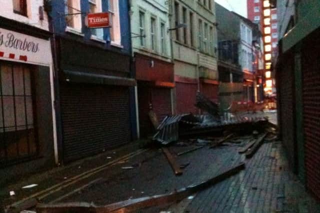 The scene of destruction on Dunluce Street the morning after the storm.  INLT 50-690-CON