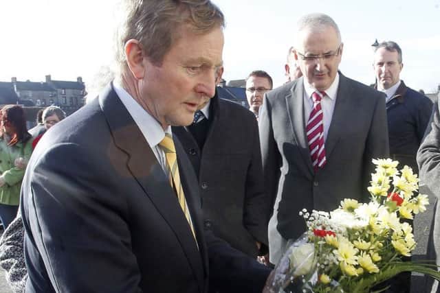 Taoiseach Enda Kenny during a trip to Northern Ireland to meet with Kingsmills Massacre family members