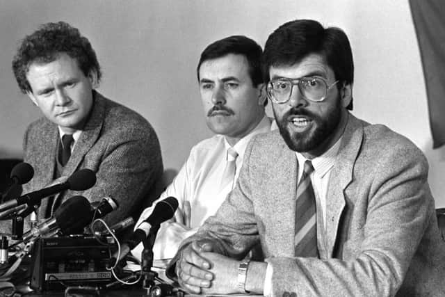 Sinn Feins Martin McGuinness, Mitchel McLaughlin and Gerry Adams  at a Londonderry news conference in 1987