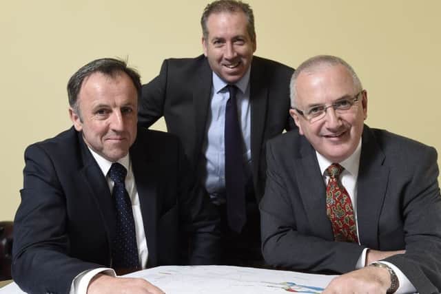 Flashback to last year when then Transport Minister Danny Kennedy announced that the contract for the development of the A6 Randalstown to Castledawson Dualling Project has been awarded to the Graham/Farrans Joint Venture.  Pictured with Transport Minister, Danny Kennedy (right) are John Wilson, Farrans (left) and Leo Martin, Graham Construction. Picture: Michael Cooper