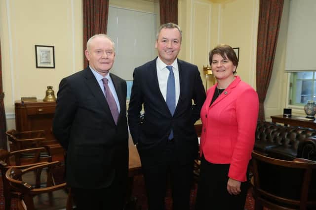 Asda CEO Andy Clarke, centre, with Mrs Foster and Mr McGuinness