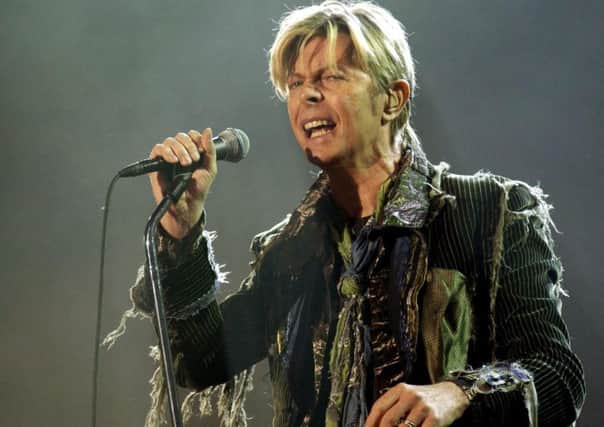 David Bowie performing live onstage during the Isle of Wight festival at Seaclose Park in Newport, Isle of Wight, 2004   Yui Mok/PA Photos