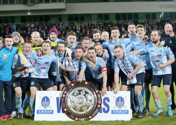 Ballymena celebrate winning the 

Toals Bookmakers County Antrim Shield Final