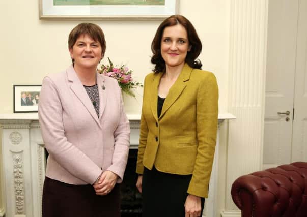 First Minister Arlene Foster is pictured on Thursday, January 14, with Secretary of State for Northern Ireland Theresa Villiers at Stormont Castle during their first meeting since Mrs Foster became First Minister of Northern Ireland on Monday