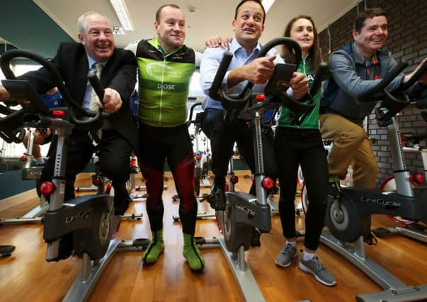 Minister for Health Leo Varadkar (centre) with (from left to right) Minister of State for Tourism & Sport Michael Ring, Paralympic cyclist Cathal Miller, cyclist Ciara Doogan, and Minster for Transport, Tourism & Sport Paschal Donohoe, at Ballybough Community, Youth & Fitness Centre, Dublin