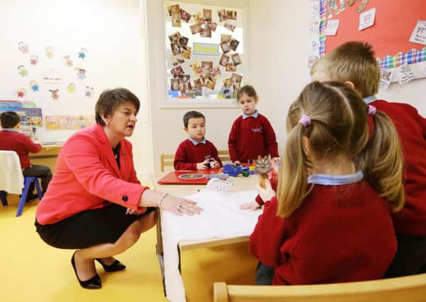 Arlene Foster visits Pond Park Primary School in Lisburn on her first engagement as first minister. She said she felt a responsibility to lead the country in a way that ensures that the children have every opportunity to succeed.  Picture by Kelvin Boyes / Press Eye