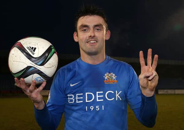 Eoin Bradley celebrates after scoring a hat-trick in a 3-3 draw against  Cliftonville