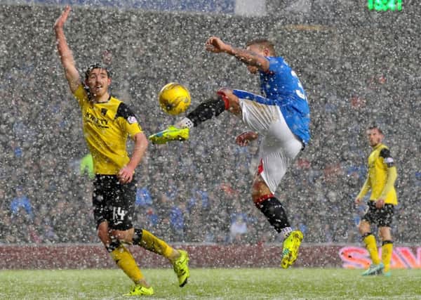 Rangers' Martyn Waghorn scores his side's fourth goal