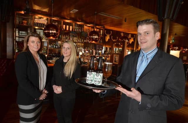 Ciara McGreevy of Mourne Mountains Brewery, centre, with Lisa Kennedy, manager of The Cloth Ear Michael Patterson, cocktail bar manager at The Merchant Hotel